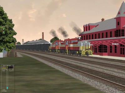 On another day another not likely photo of three SW1200RSs this time  pulling hard on a loaded gypsum train photogenically caught in front of the Kentville station.