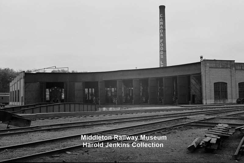 File:DAR - Kentville Roundhouse with SW1200s-12June1960.JPG